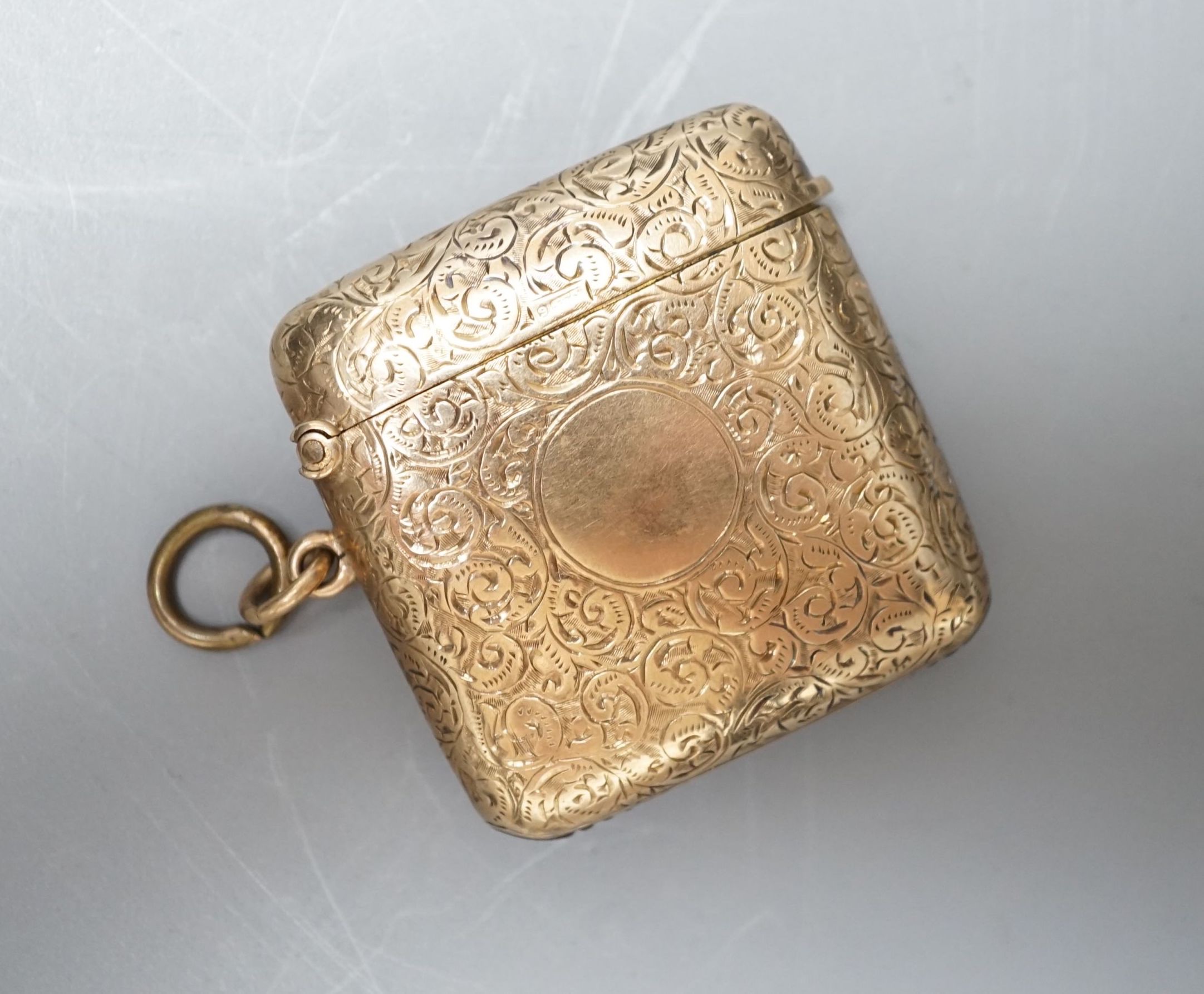 An Edwardian engraved 9ct gold vesta case, by S. Blanckensee & Sons Ltd, Birmingham, 1909, 41mm, gross weight 20.5 grams.